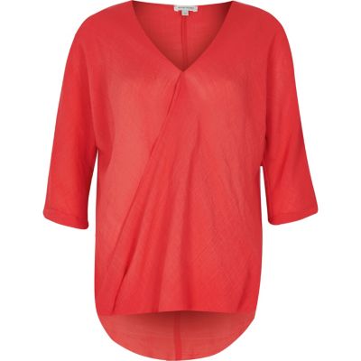 Red wrap blouse